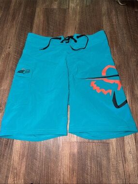 Fox Racing Boys Size 27 Moto Board Shorts Turquoise, Orange and Black